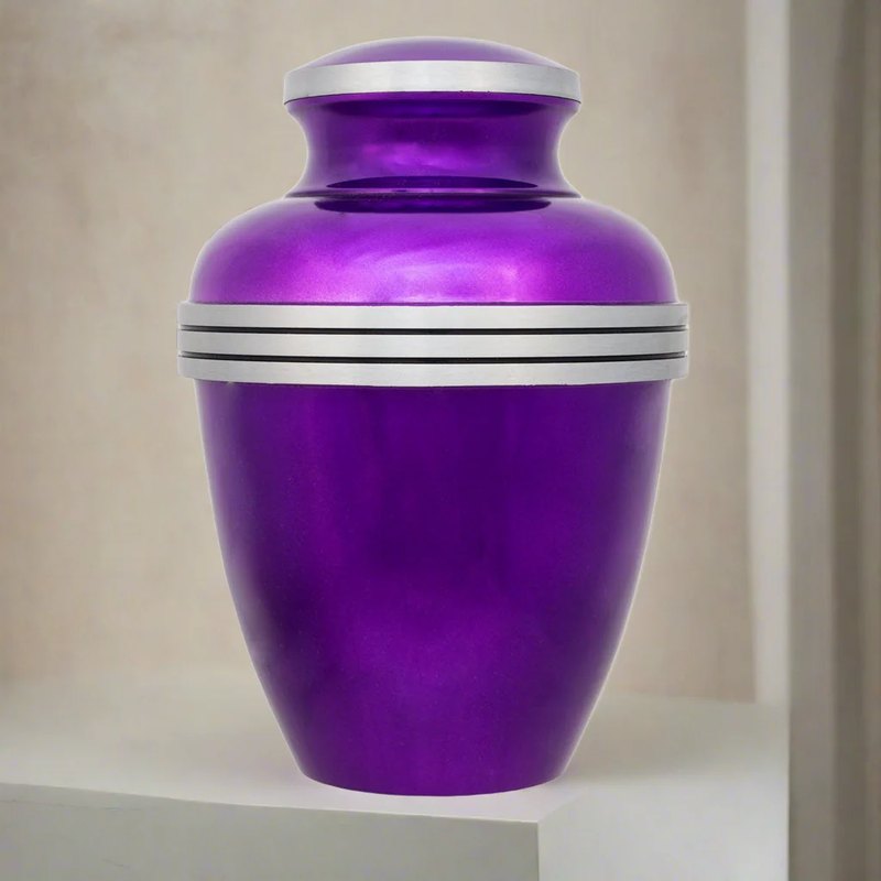 Dark purple banded metal cremation urn